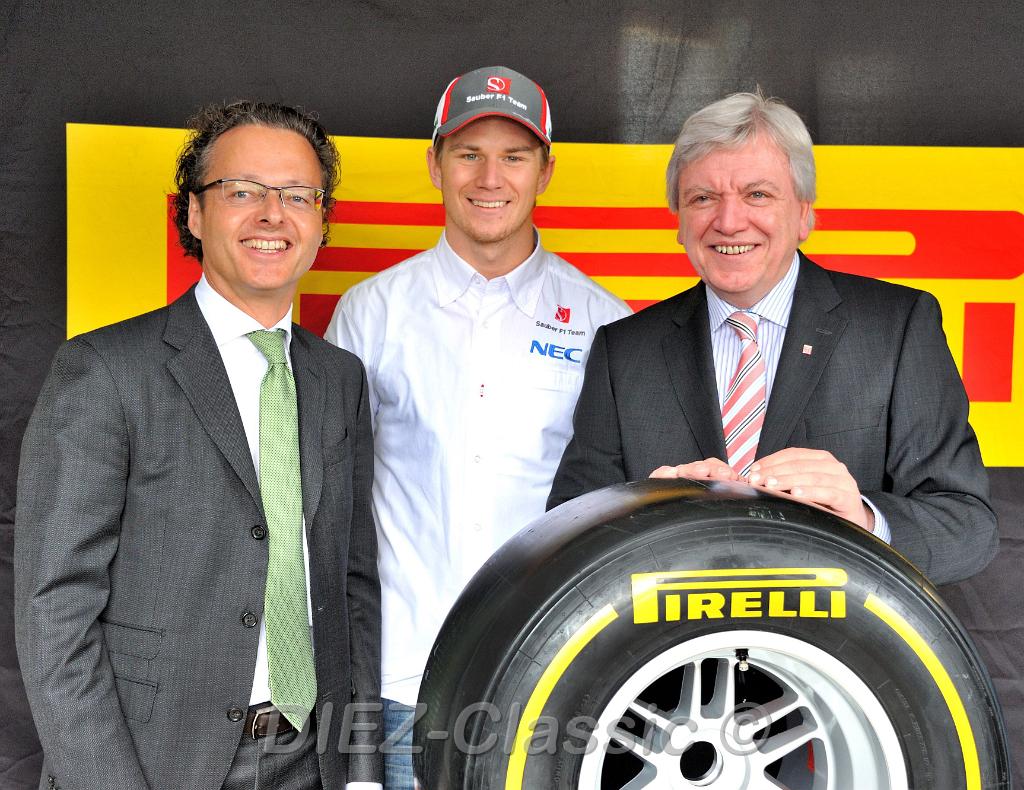 pirelli-feier_michael_schwoebel_nico_huelkenberg_volker_bouffier.jpg